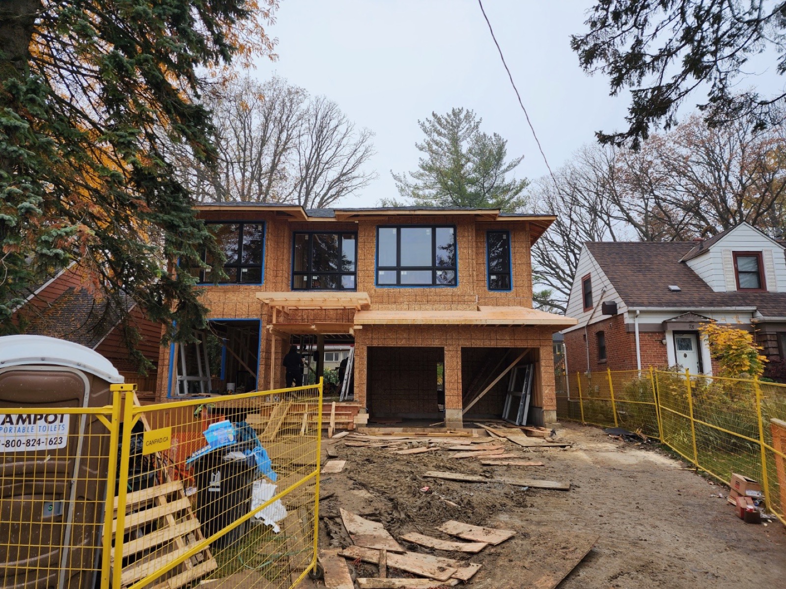 Full second-storey addition and rear extension under construction