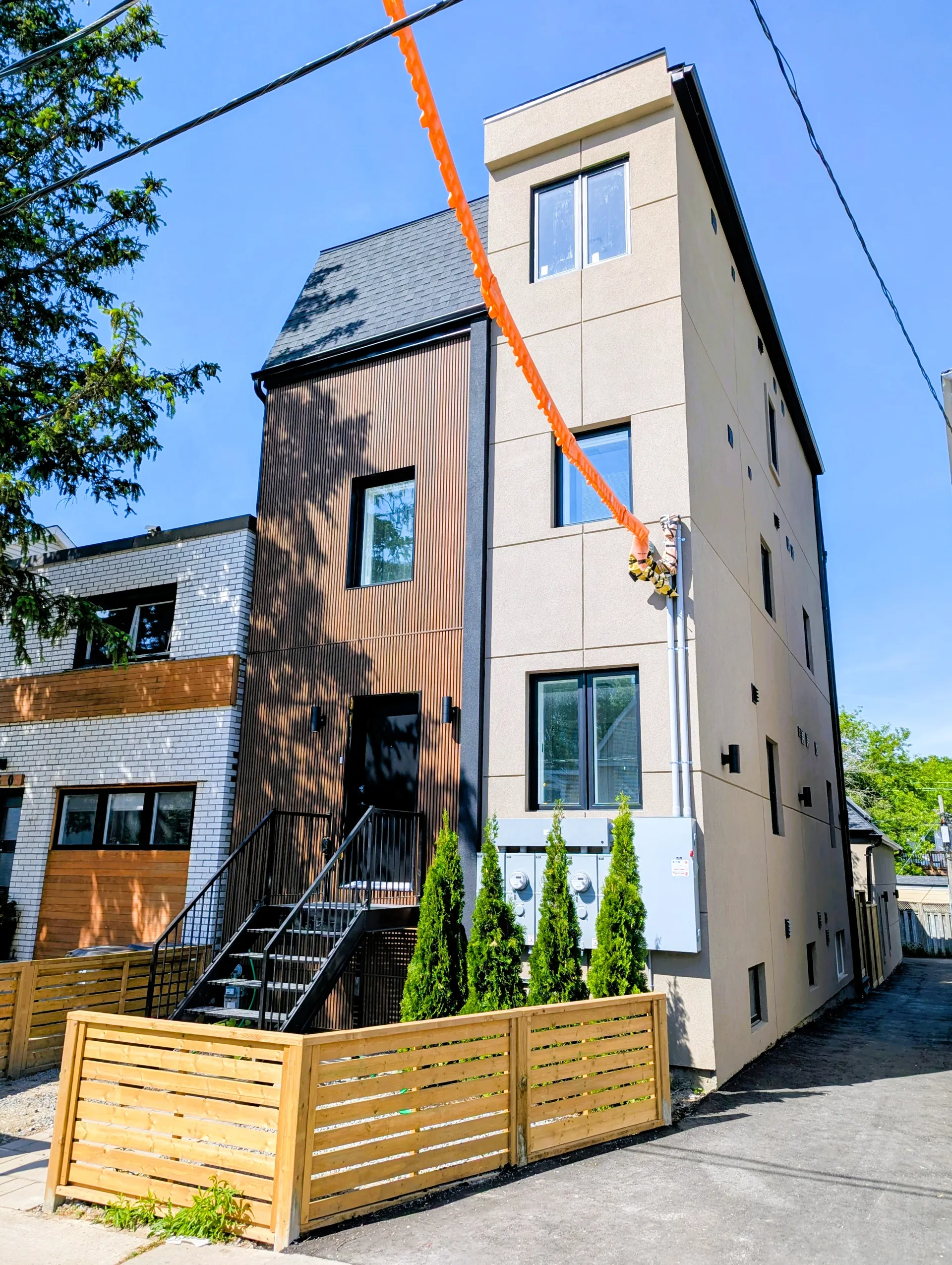 Completed multi-unit rental building, Riverdale